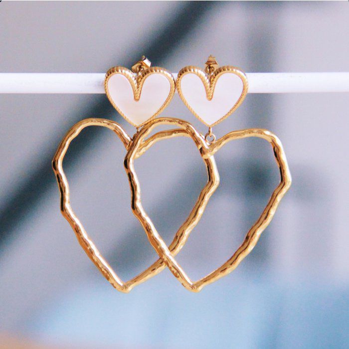 Statement oorbel met parelmoer en open hart